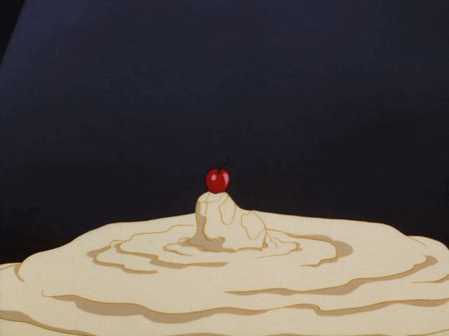 1girl all_fours animated animated_gif ass batman_(series) cherry_(fruit) dc dc_comics dcau female female_only gif harley_quinn heart pudding solo top-down_bottom-up