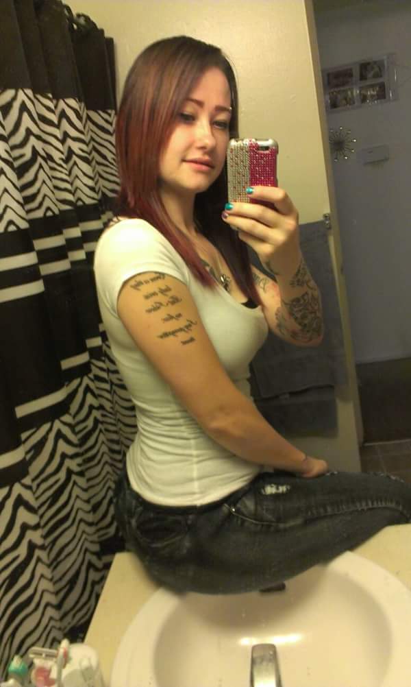 1girl bathroom big_ass jeans mirror multicolored_nails nail_polish pants selfpic sink tattoo tattoos towel