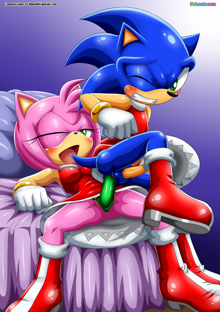 amy_rose anal anal_penetration bbmbbf bed blue_fur blush boots bracelets crossdressing green_eyes gritted_teeth hairband laying_down mobius_unleashed palcomix pink_fur red_boots red_dress sega sonic_(series) sonic_the_hedgehog sonic_the_hedgehog_(series) strap-on