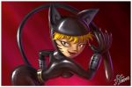 1_female 1girl ass bent_over black_catsuit blonde_hair breasts catsuit clothed female female_only fernando_faria_(artist) grin hetero katnappe looking_at_viewer solo_female standing xiaolin_showdown