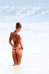  beach bikini female ocean solo tattoo water 
