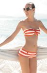  1girl armpits bare_shoulders beach bikini female midriff navel small_breasts smile solo sunglasses swimsuit tagme teeth tubetop water 
