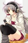  1_girl black_legwear breasts buttons candy cellphone cleavage collarbone copyright_request headphones hood hoodie jewelry long_hair looking_at_viewer necklace open_mouth phone pillow saeki_hokuto shorts silver_hair sitting solo stockings sweater thighhighs very_long_hair yellow_eyes 